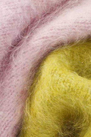Fabric Science Popularization: Cashmere Texturing showcasing an oversized women's autumn winter sweater crafted from soft cashmere with a brushed knit and drop shoulder design.